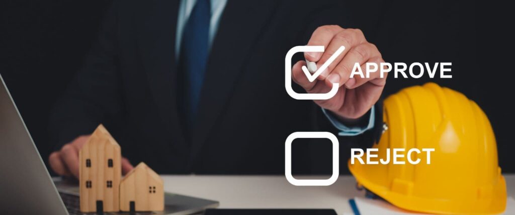 This image represents the concept of approving or rejecting construction projects and building permits, highlighting the inspection and authorisation process.